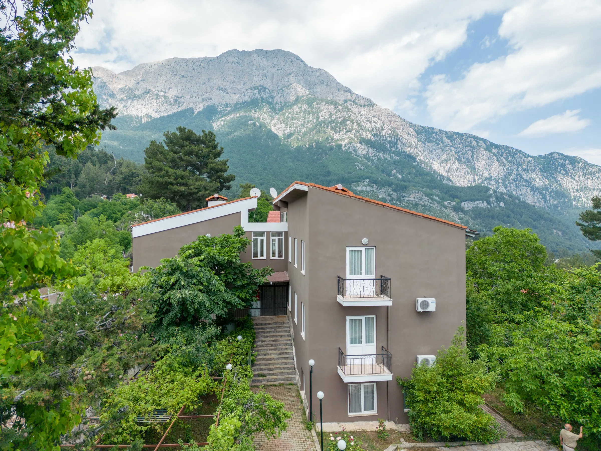 The house in the pines, with Tahtalı Dağı behind.